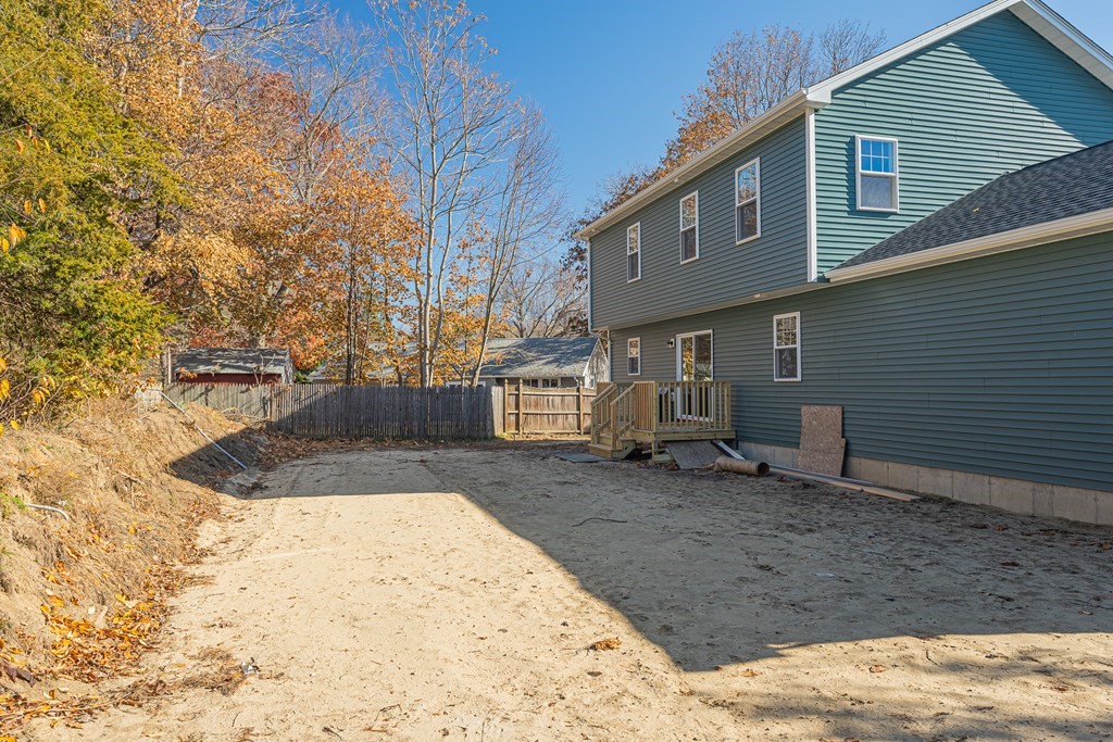 16 Cornflower Street Springfield, MA 01118 - Photo 3 of 36 a front view of a house with a yard