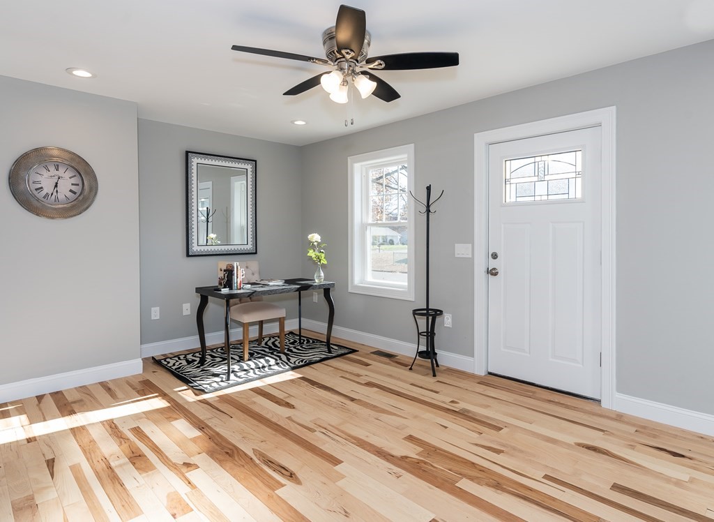 16 Cornflower Street Springfield, MA 01118 - Photo 6 of 36 a living room with a bed furniture and a window