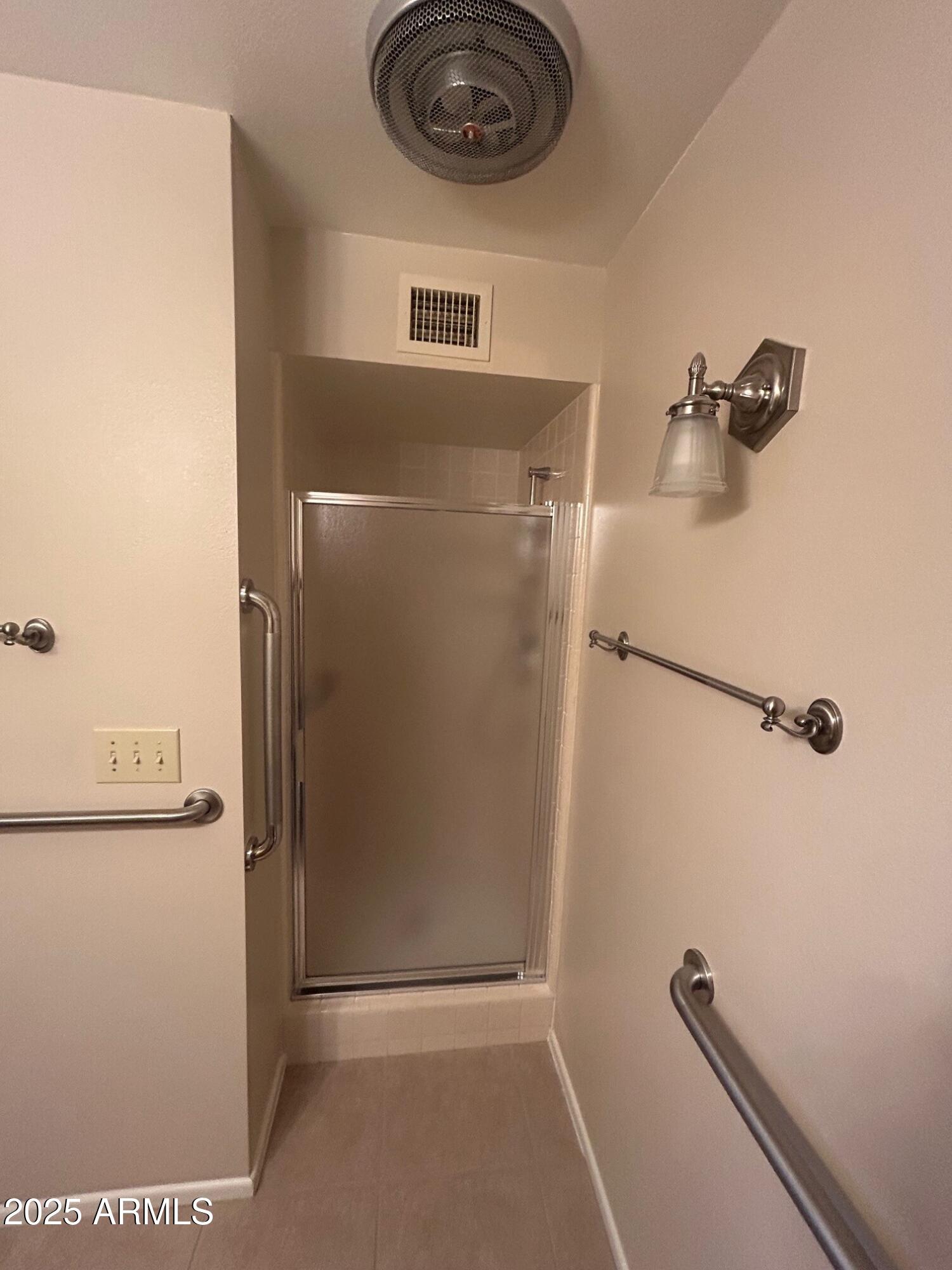 4328 East Capri Avenue, Unit 194 Mesa, AZ 85206 - Photo 5 of 13 a bathroom with a sink and a shower