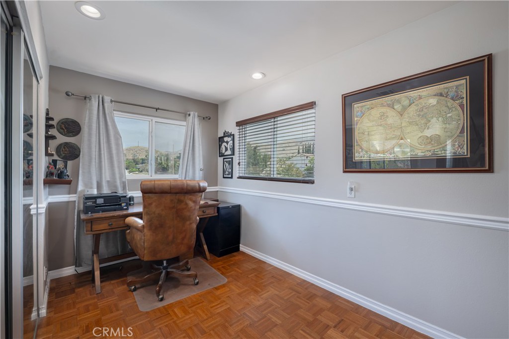 2203 Homewood Avenue Simi Valley, CA 93063 - Photo 29 of 37 a view of a workspace with furniture and a window