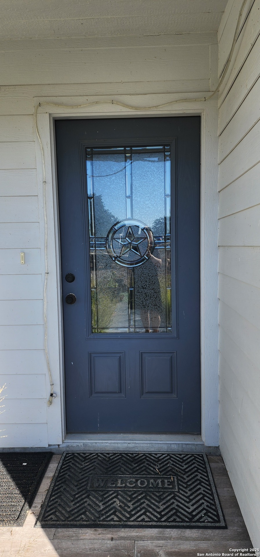 a view of a entryway door of the house