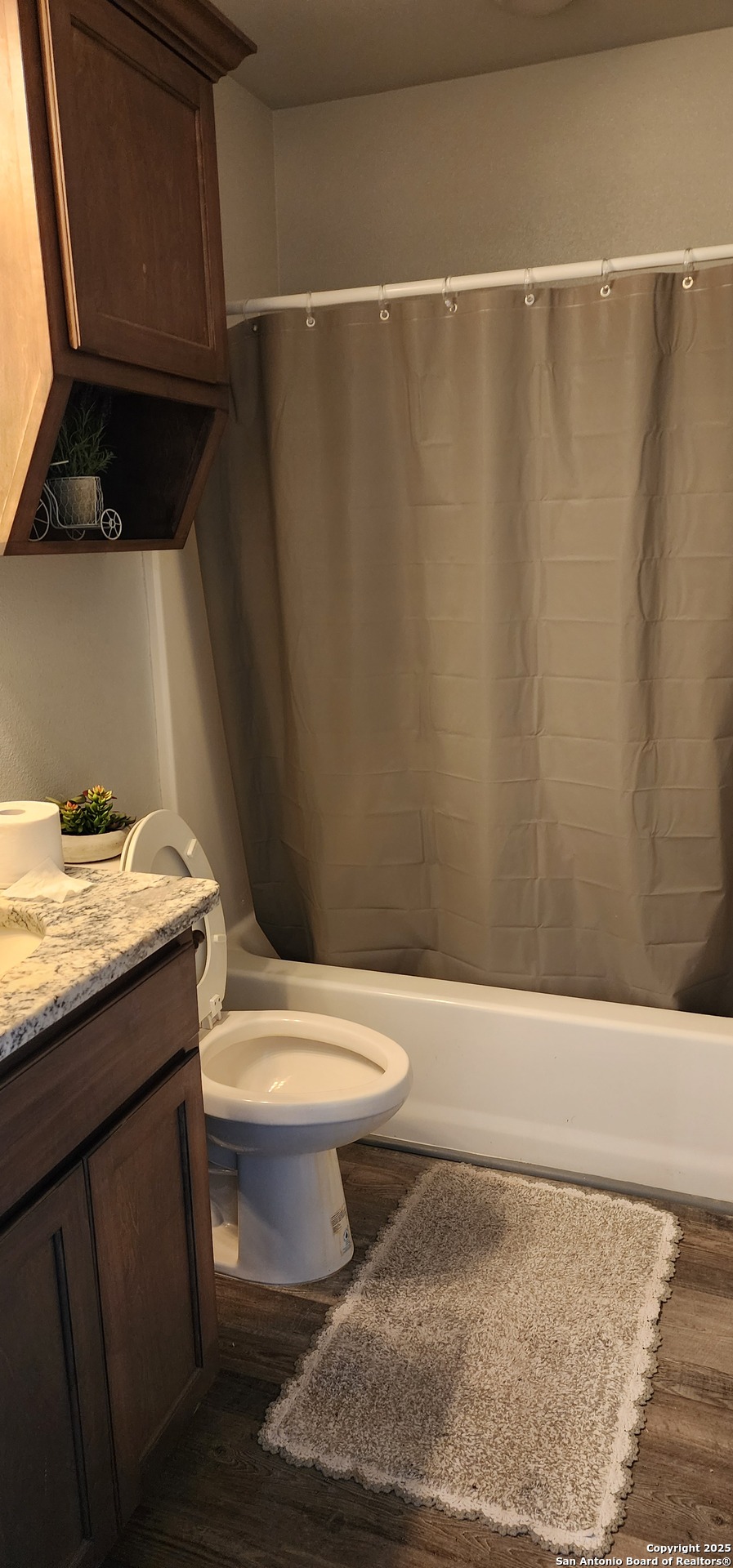 100 Lk Vw Terrace Three Rivers, TX 78071 - Photo 5 of 5 a bathroom with a granite countertop toilet and a sink