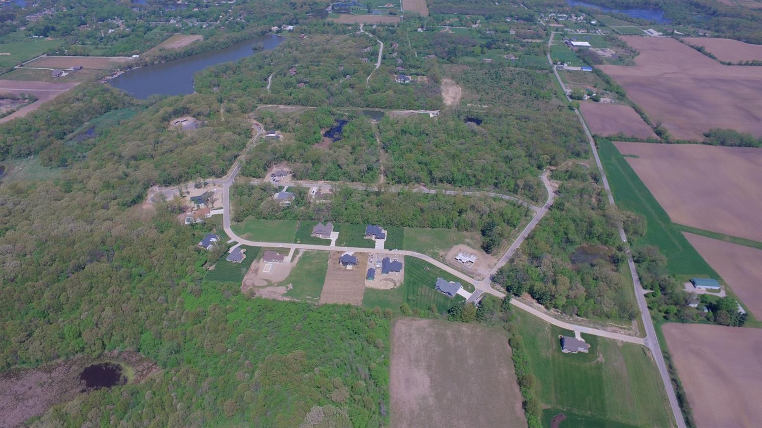 77 Noble Street Lowell, IN 46356 - Photo 2 of 4 an aerial view of house with outdoor space