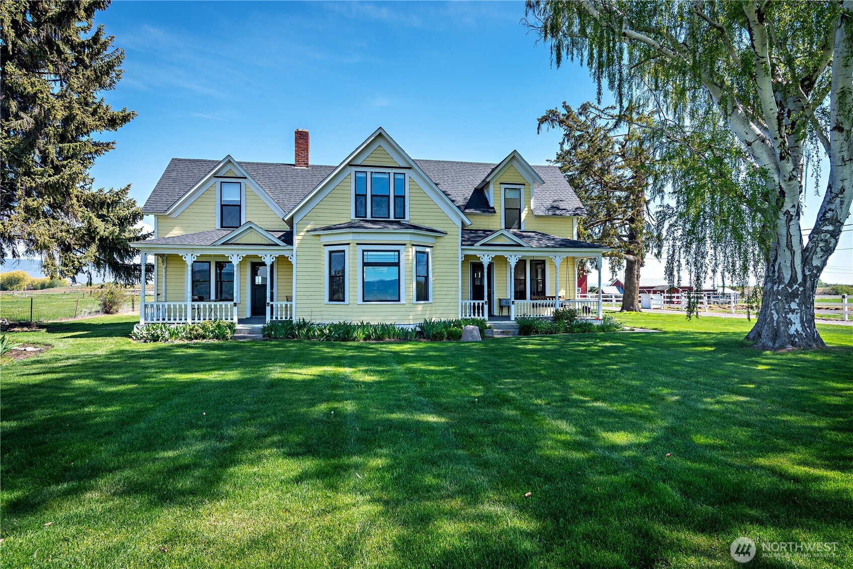 4441 Dry Creek Road Ellensburg, WA 98926 - Photo 1 of 32 a front view of a house with a garden