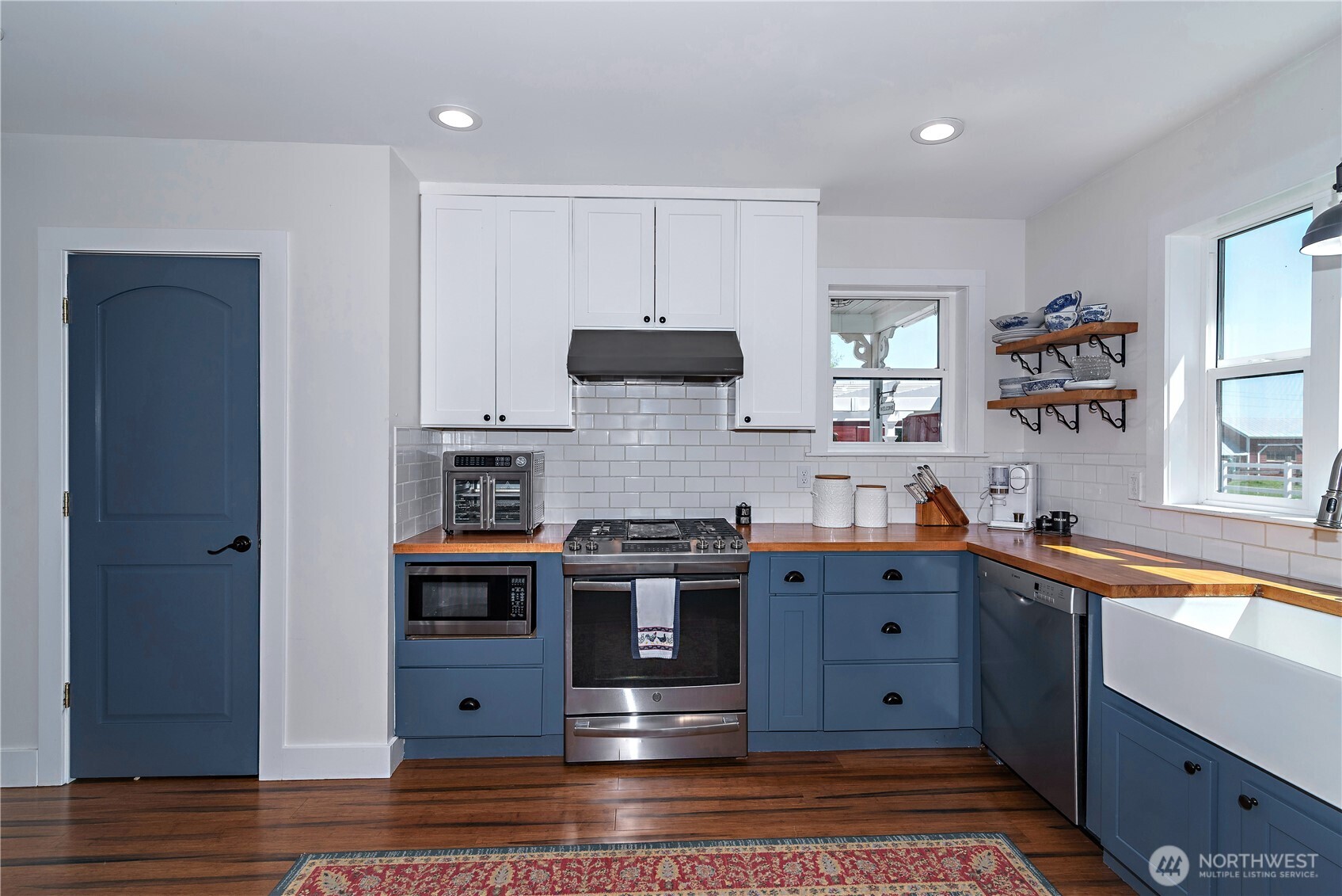 4441 Dry Creek Road Ellensburg, WA 98926 - Photo 11 of 32 a kitchen with stainless steel appliances granite countertop a stove and a sink