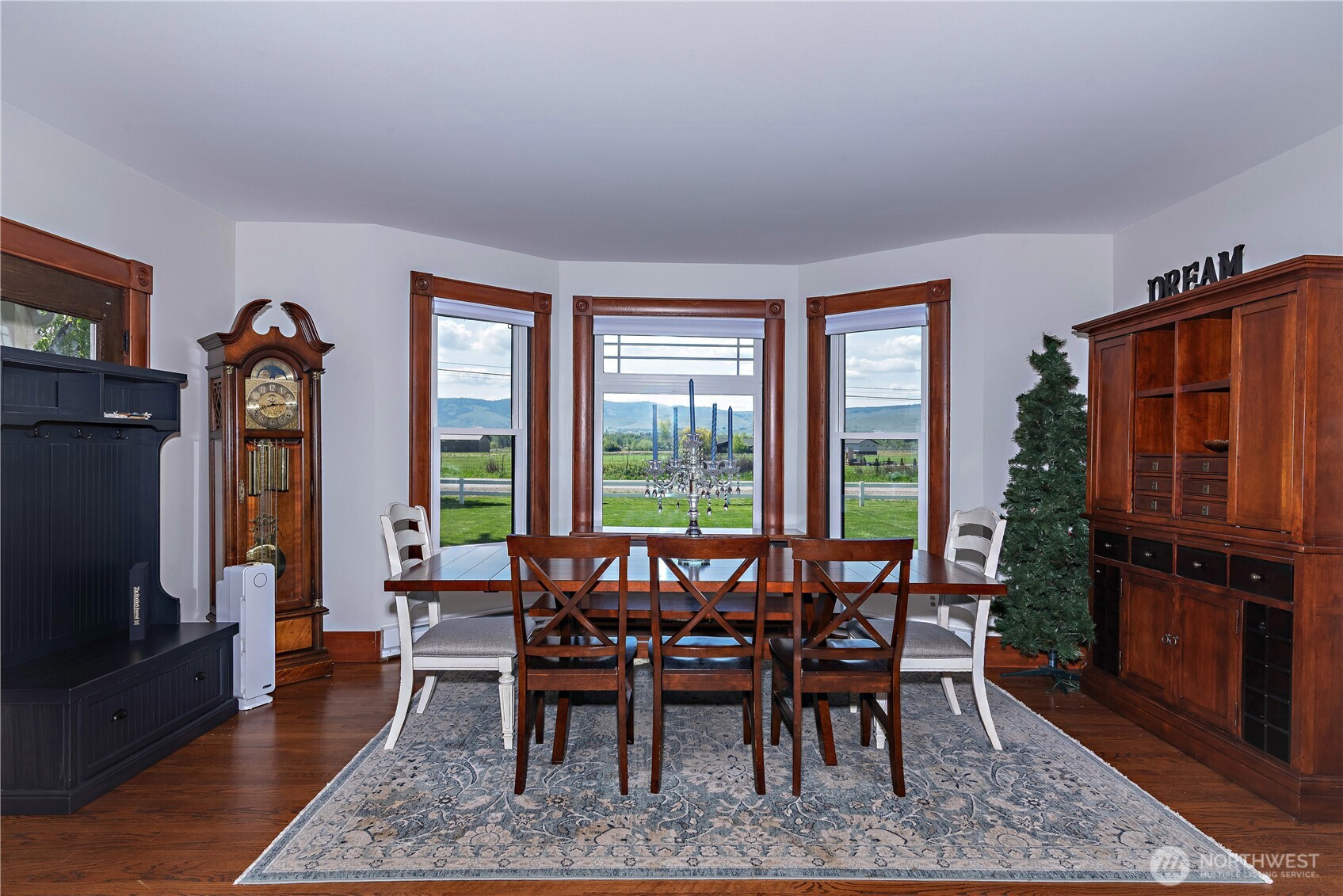 4441 Dry Creek Road Ellensburg, WA 98926 - Photo 17 of 32 a view of a dining room with furniture window and wooden floor
