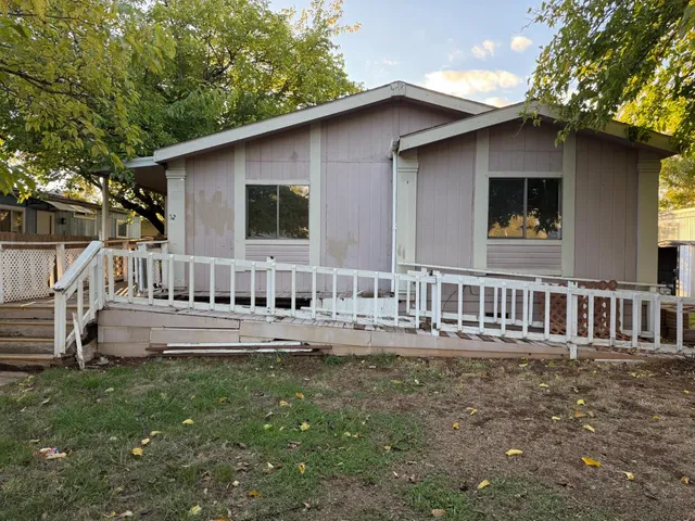 a house view with a garden space