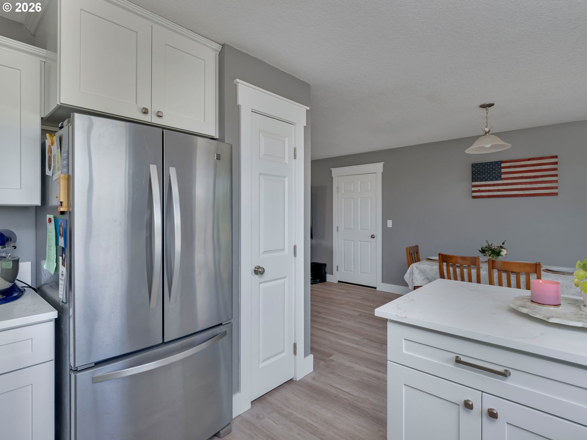 19775 Northeast Trunk Road Dundee, OR 97115 - Photo 10 of 48 a kitchen with stainless steel appliances a refrigerator and cabinets