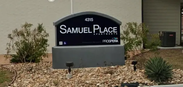 a sign on the side of the road