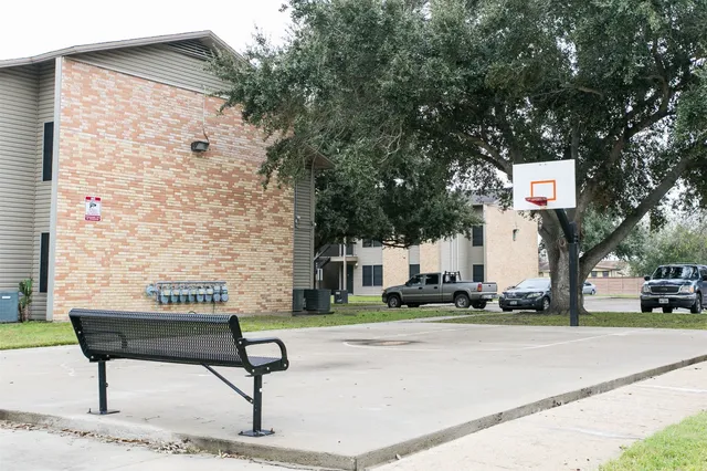 swimming pool view with a garden and shower