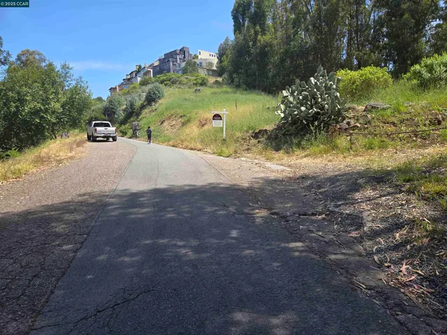 a view of swimming pool from a yard