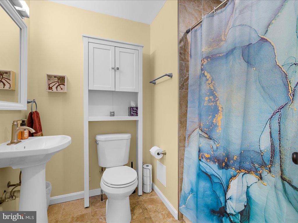 8195 Old Mill Road Pasadena, MD 21122 - Photo 30 of 51 Hall Bathroom