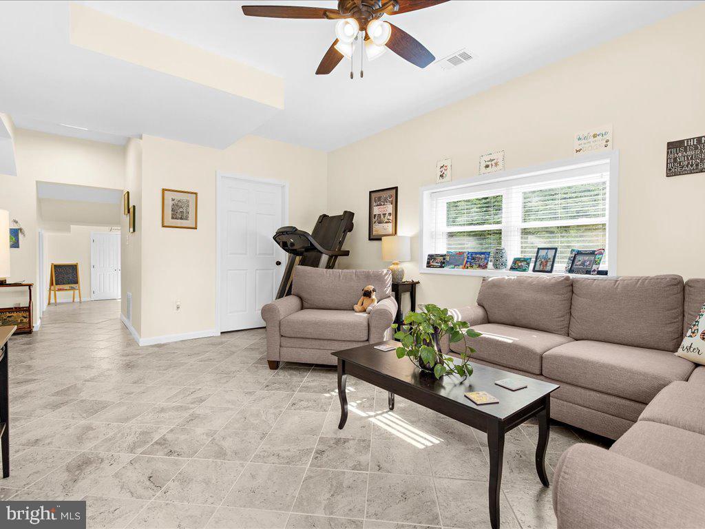 8195 Old Mill Road Pasadena, MD 21122 - Photo 31 of 51 Lower Level Family Room