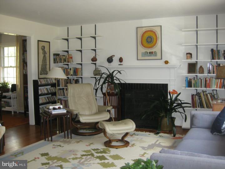 340 Jefferson Road Princeton, NJ 08540 - Photo 2 of 12 a living room with furniture and a fireplace