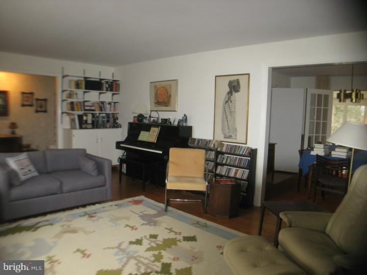 340 Jefferson Road Princeton, NJ 08540 - Photo 5 of 12 a living room with furniture and a dining table with rug