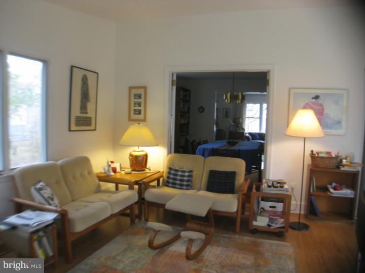340 Jefferson Road Princeton, NJ 08540 - Photo 8 of 12 a living room with furniture and a lamp