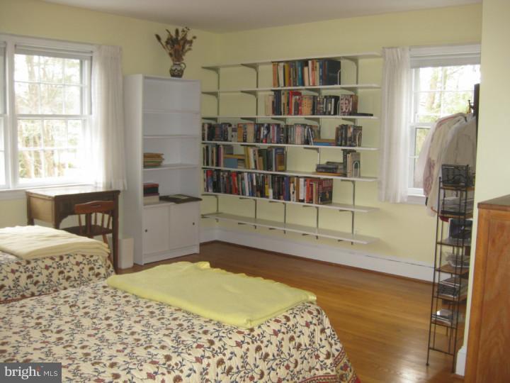 340 Jefferson Road Princeton, NJ 08540 - Photo 10 of 12 a bedroom with a bed and a window