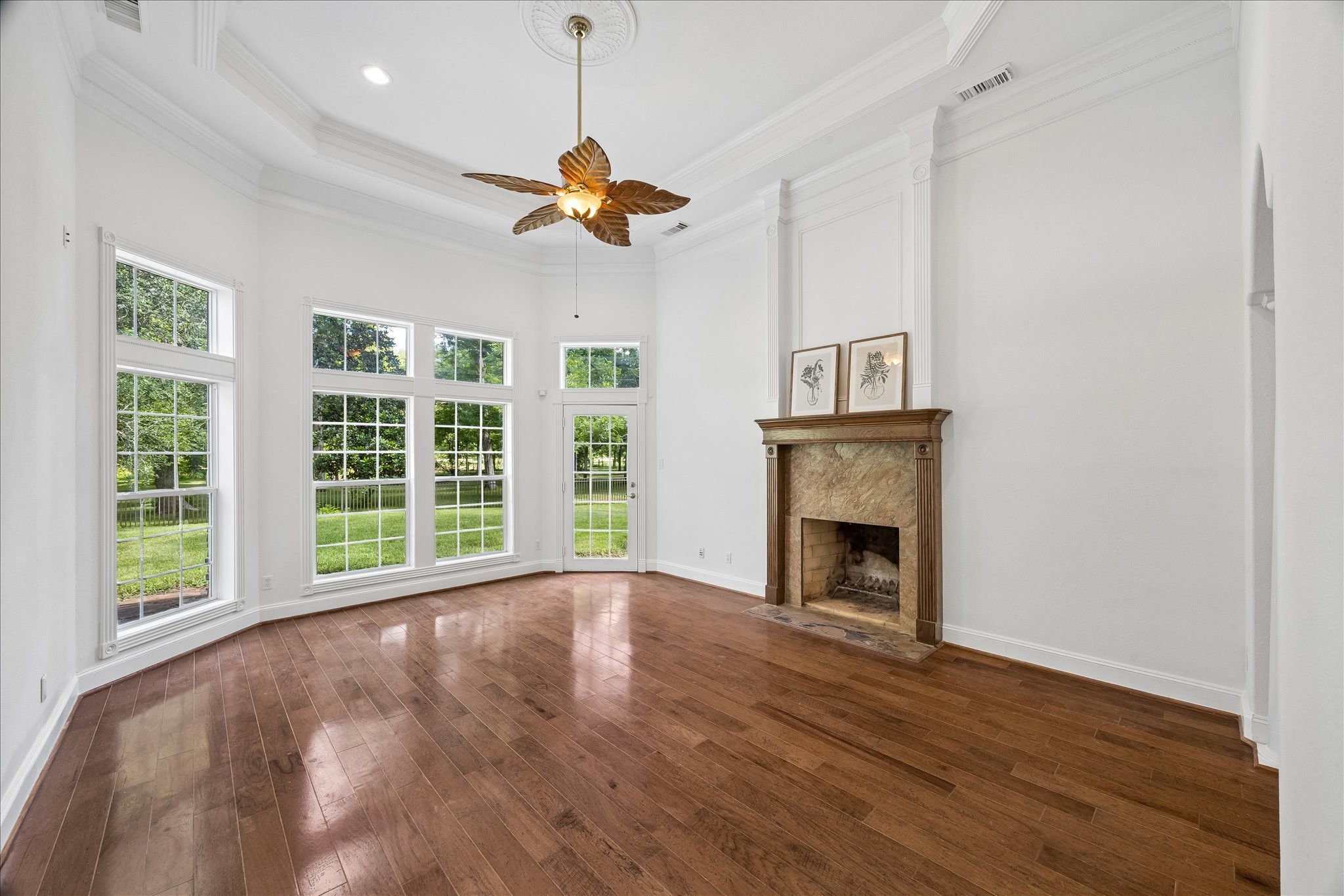 18202 County Road 40 Road Rosharon, TX 77583 - Photo 16 of 43 Primary bedroom on the 1st floor with a fireplace