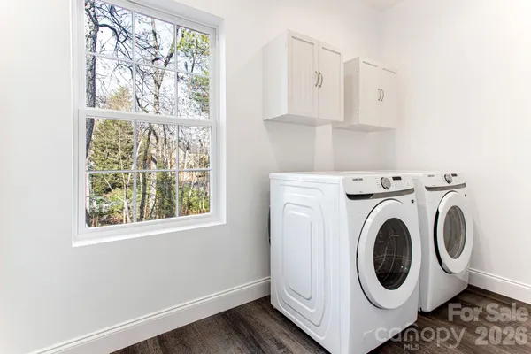 an empty room with a bathroom