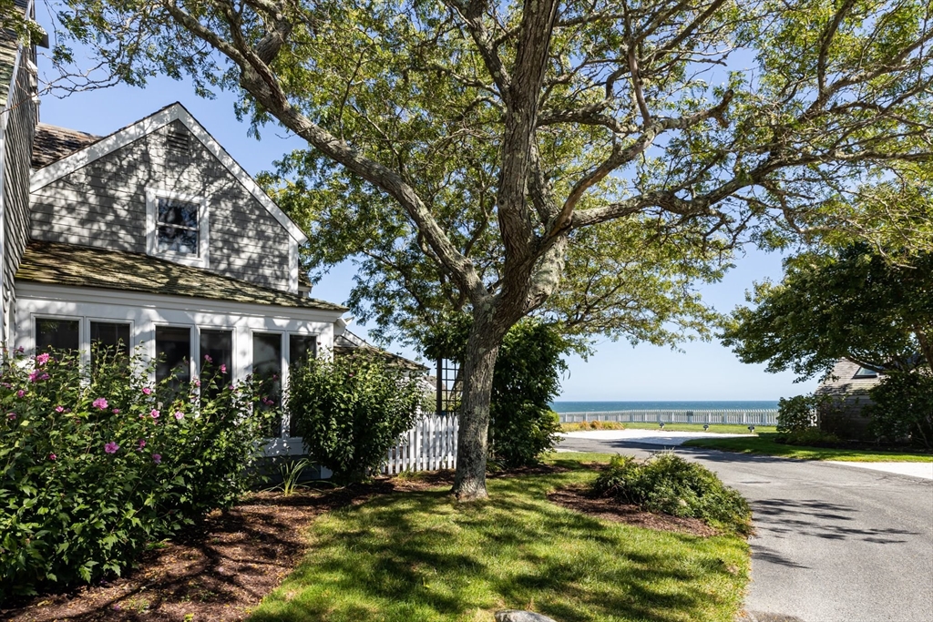 21 Milestone Way, Unit 620 Mashpee, MA 02649 - Photo 28 of 28 a view of a house with a tree in front
