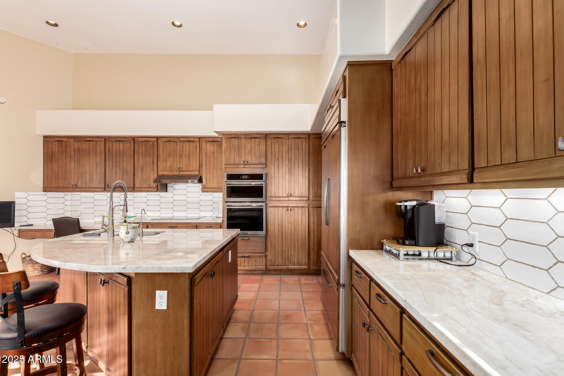 31 West Beryl Avenue Phoenix, AZ 85021 - Photo 11 of 65 a kitchen with a sink refrigerator and cabinets
