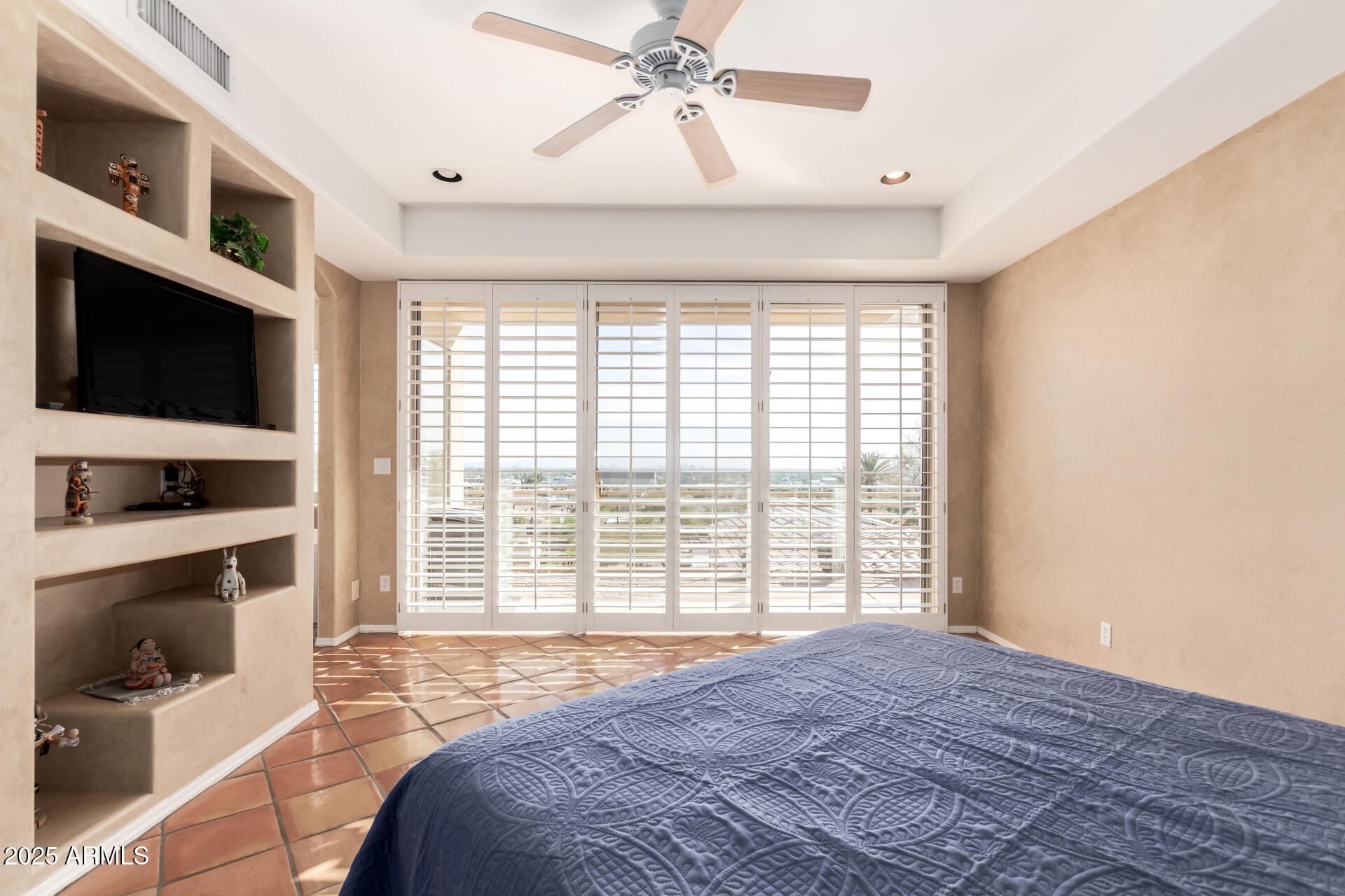 31 West Beryl Avenue Phoenix, AZ 85021 - Photo 24 of 65 a bedroom with a bed and a flat tv screen