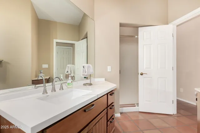 a view of swimming pool with a table and chairs