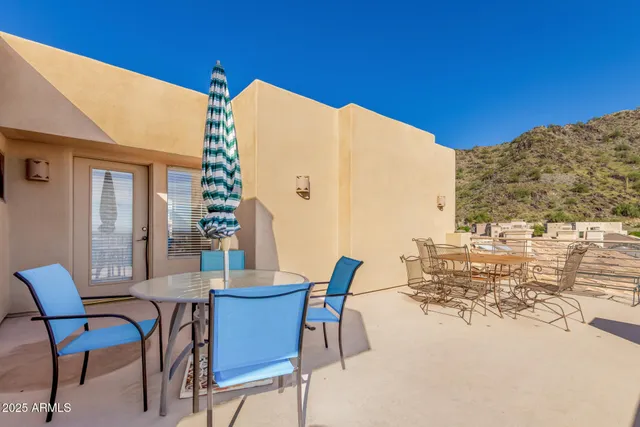 a view of a balcony with many windows