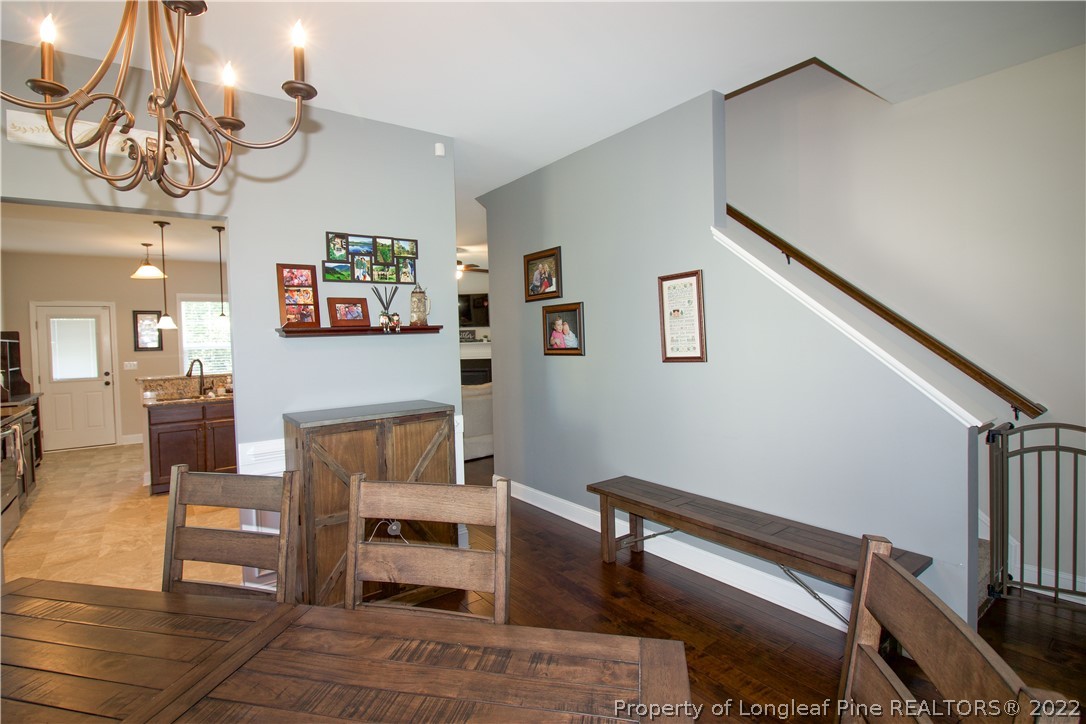 202 Sandy Springs Road Aberdeen, NC 28315 - Photo 14 of 44 a bedroom with furniture and a piano