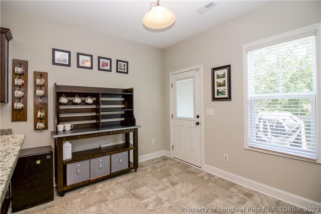 202 Sandy Springs Road Aberdeen, NC 28315 - Photo 19 of 44 a view of entryway and hall with a window