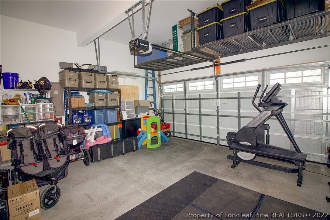 202 Sandy Springs Road Aberdeen, NC 28315 - Photo 38 of 44 a view of a room with gym equipment