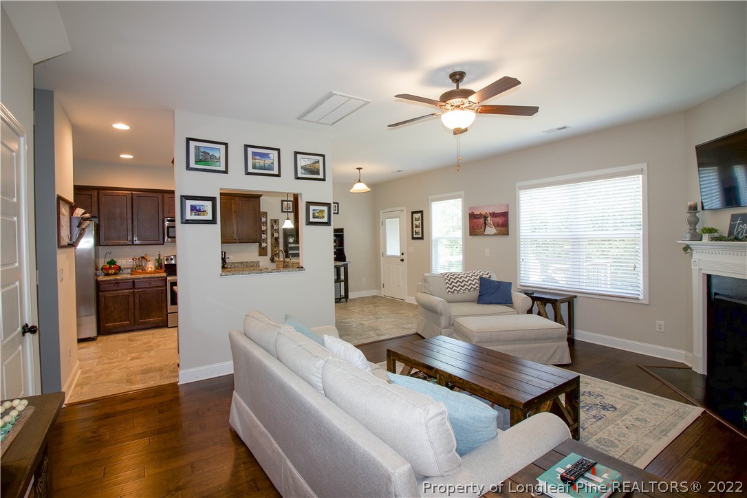 202 Sandy Springs Road Aberdeen, NC 28315 - Photo 4 of 44 a living room with furniture and a window
