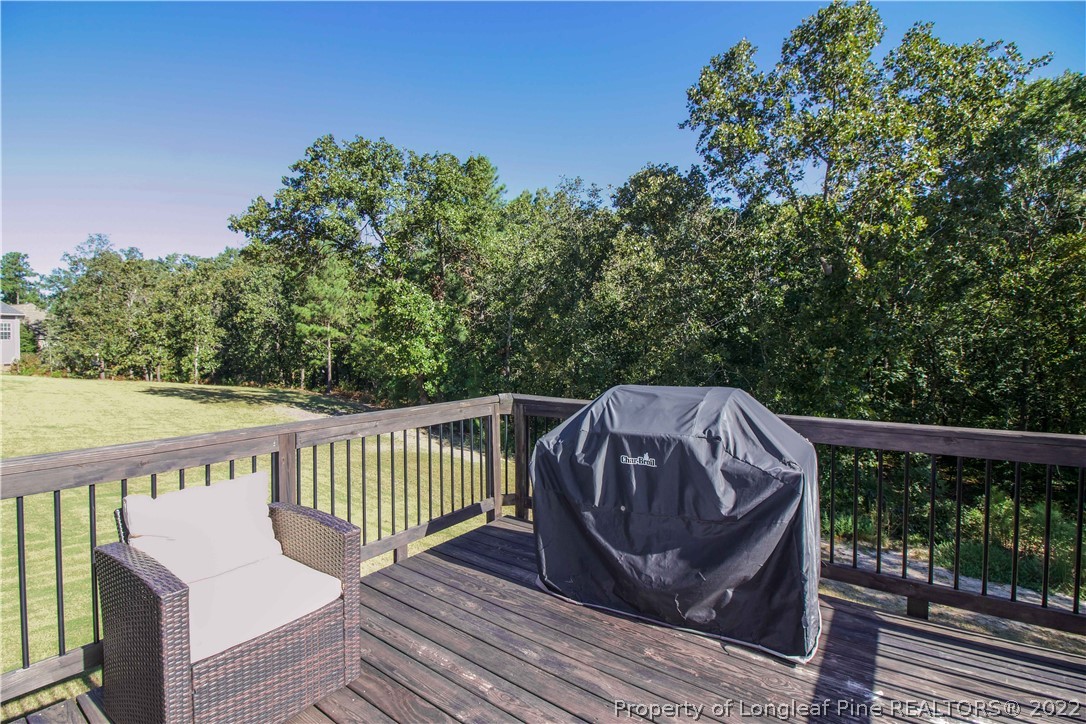 202 Sandy Springs Road Aberdeen, NC 28315 - Photo 43 of 44 a view of a two chairs in the deck