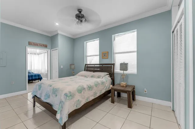 a bedroom with a bed and a table in it