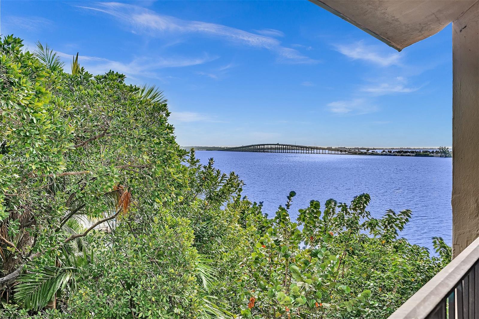 2201 Brickell Avenue, Unit 89 Miami, FL 33129 - Photo 21 of 56 view of a large body of water with a building in the background