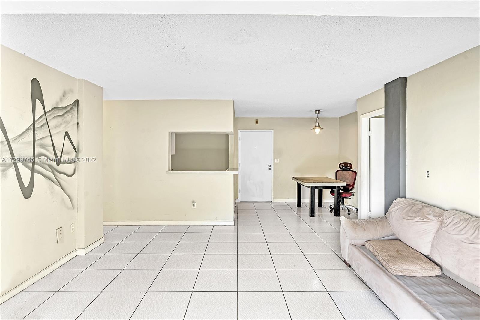 2201 Brickell Avenue, Unit 89 Miami, FL 33129 - Photo 22 of 56 a view of kitchen with furniture and window