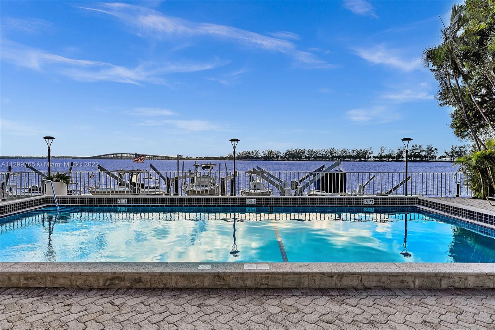 2201 Brickell Avenue, Unit 89 Miami, FL 33129 - Photo 37 of 56 a view of a swimming pool from a balcony