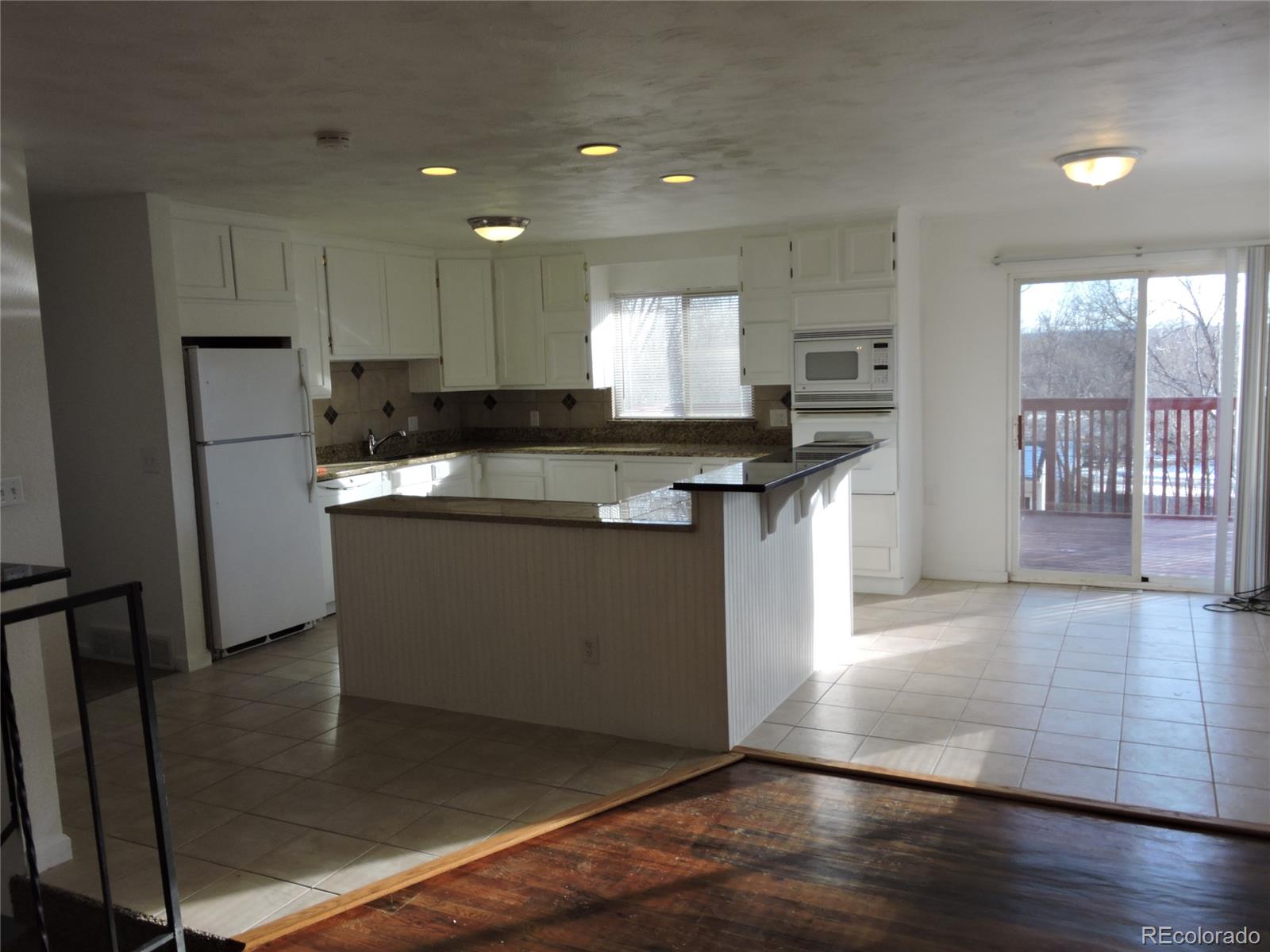 9112 Oberon Road Arvada, CO 80004 - Photo 5 of 16 Gallery Image 5