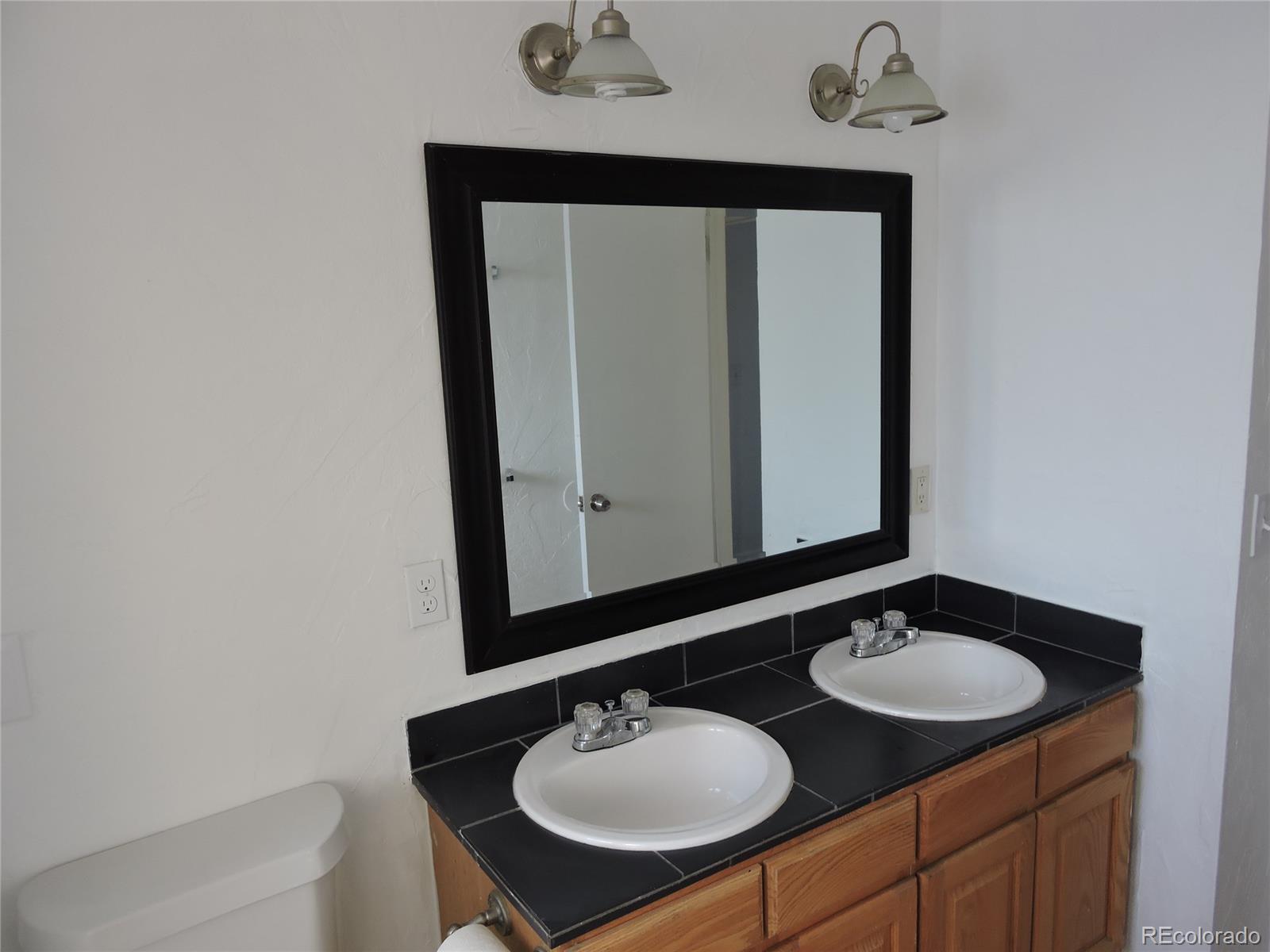 9112 Oberon Road Arvada, CO 80004 - Photo 6 of 16 Gallery Image 6