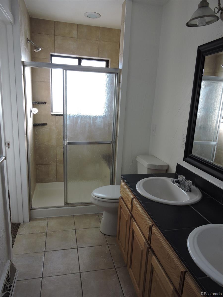 9112 Oberon Road Arvada, CO 80004 - Photo 7 of 16 Gallery Image 7