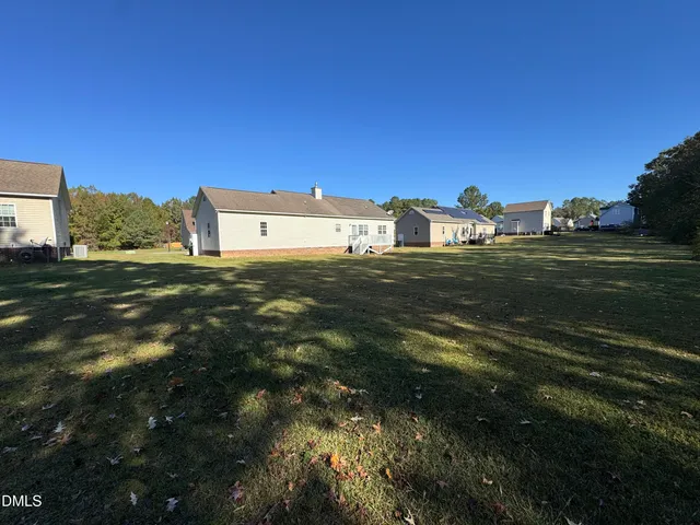 a view of a city with tall buildings in background