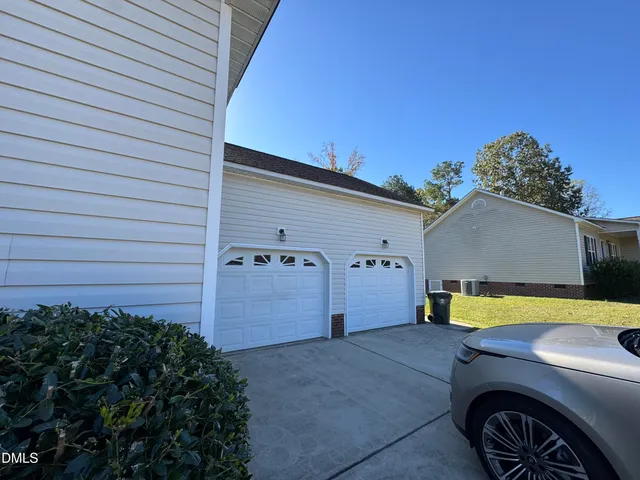 a view of a back yard of the house