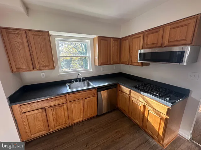 a view of kitchen and microwave