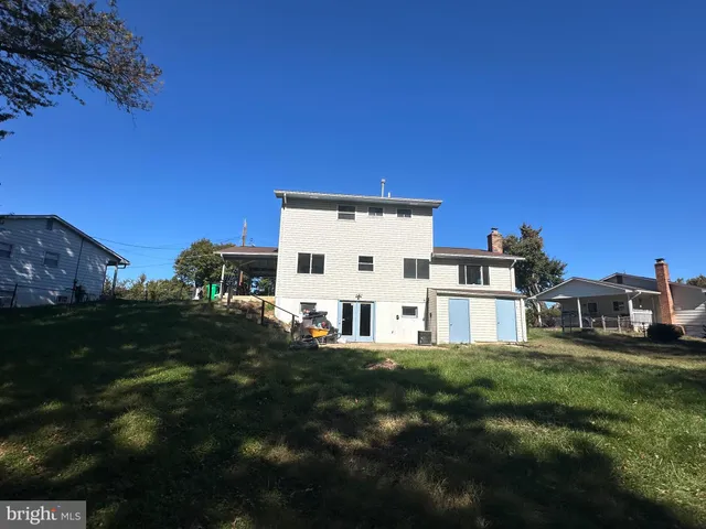 a view of a house with a big yard