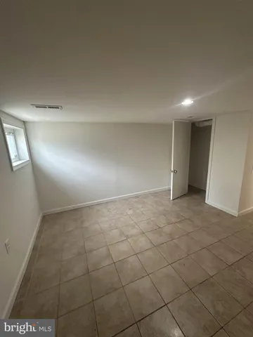 a bathroom with a toilet a sink and bathtub