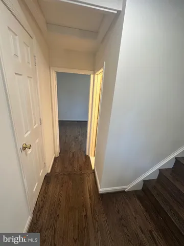 a view of room with hardwood floor