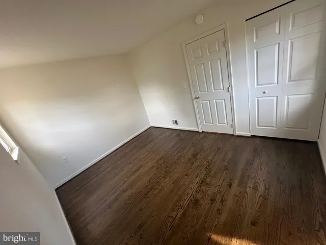 a bathroom with a sink toilet and mirror