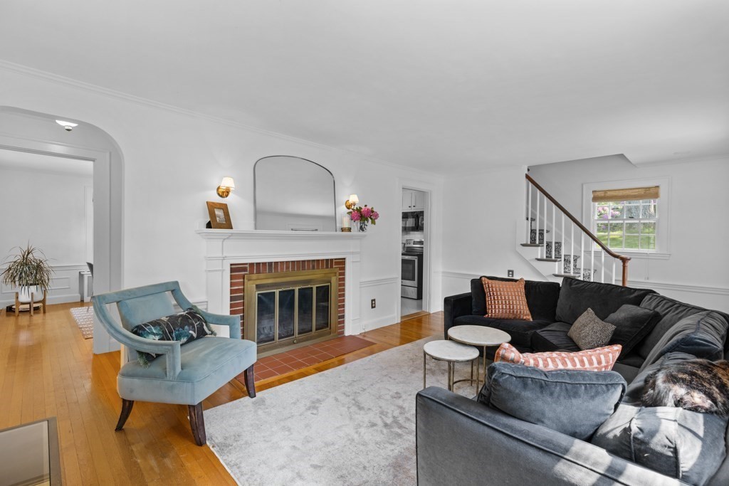 24 Pine Hill Circle Wakefield, MA 01880 - Photo 11 of 34 a living room with furniture and a fireplace