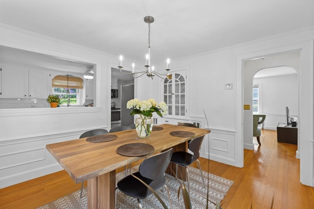 24 Pine Hill Circle Wakefield, MA 01880 - Photo 16 of 34 a view of a dining room with furniture and wooden floor