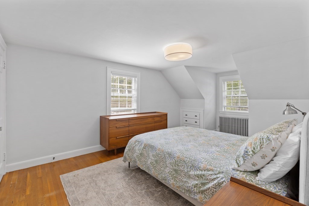 24 Pine Hill Circle Wakefield, MA 01880 - Photo 20 of 34 a bedroom with a bed and window